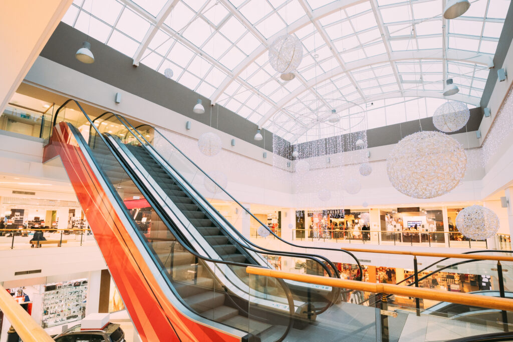 Escalator In Modern Shopping Mall Shopping Centre.